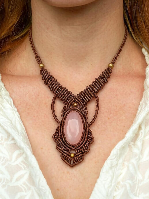 Cradled in the palm of your hand, this handwoven rose quartz pendant feels like captured morning light and the tenderness of spring. ▪️ Gemstone: Natural Rose Quartz — a symbol of love and healing. It gently soothes emotional turbulence, bringing inner pe